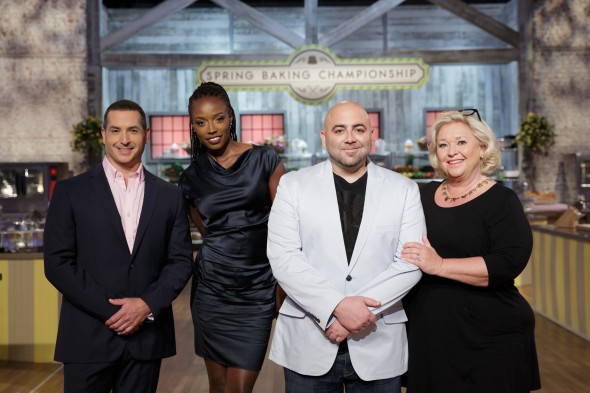 Host Bobby Deen, left, poses with the judges, from left, Lorraine Pascale, Duff Goldman, and Nancy Fuller, as seen on Food Network's Spring Baking Championship, Season 2.