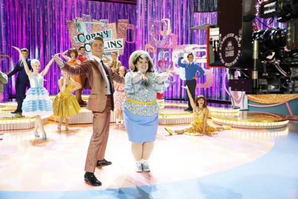 HAIRSPRAY LIVE! -- BTS Promo -- Pictured: (l-r) Dove Cameron as Amber Von Tussle, Derek Hough as Corny Collins, Maddie Baillio as Tracy Turnblad -- (Photo by: Trae Patton/NBC)